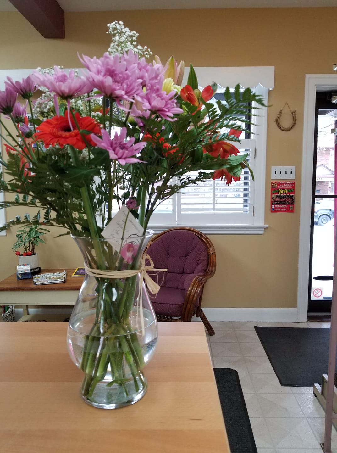 A flower bouquet left at the salon entry